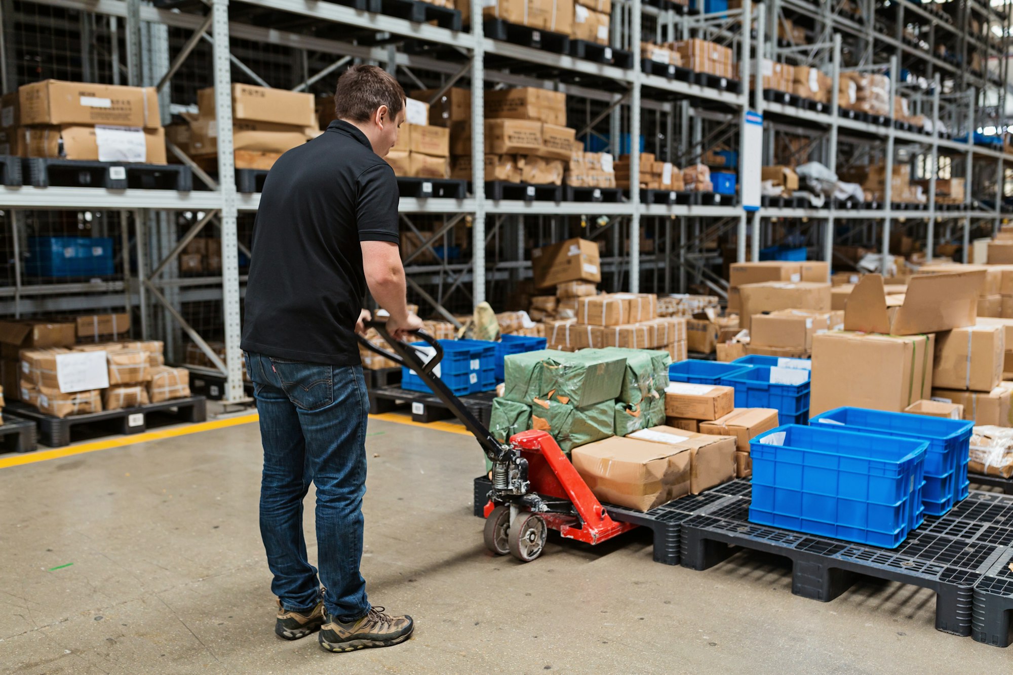 Employee working in modern warehouse